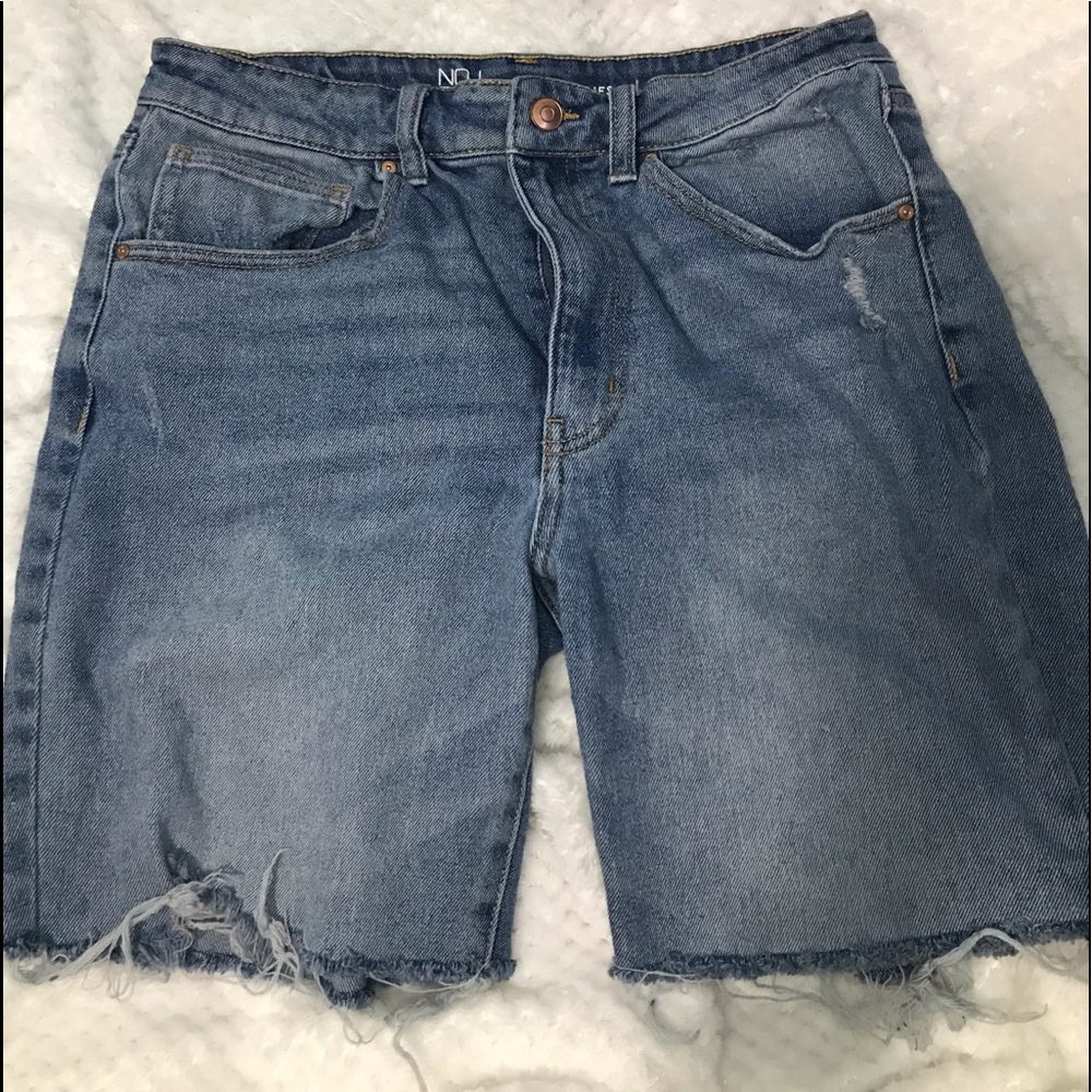 These are dark wash No boundaries hand cut jean shorts.
